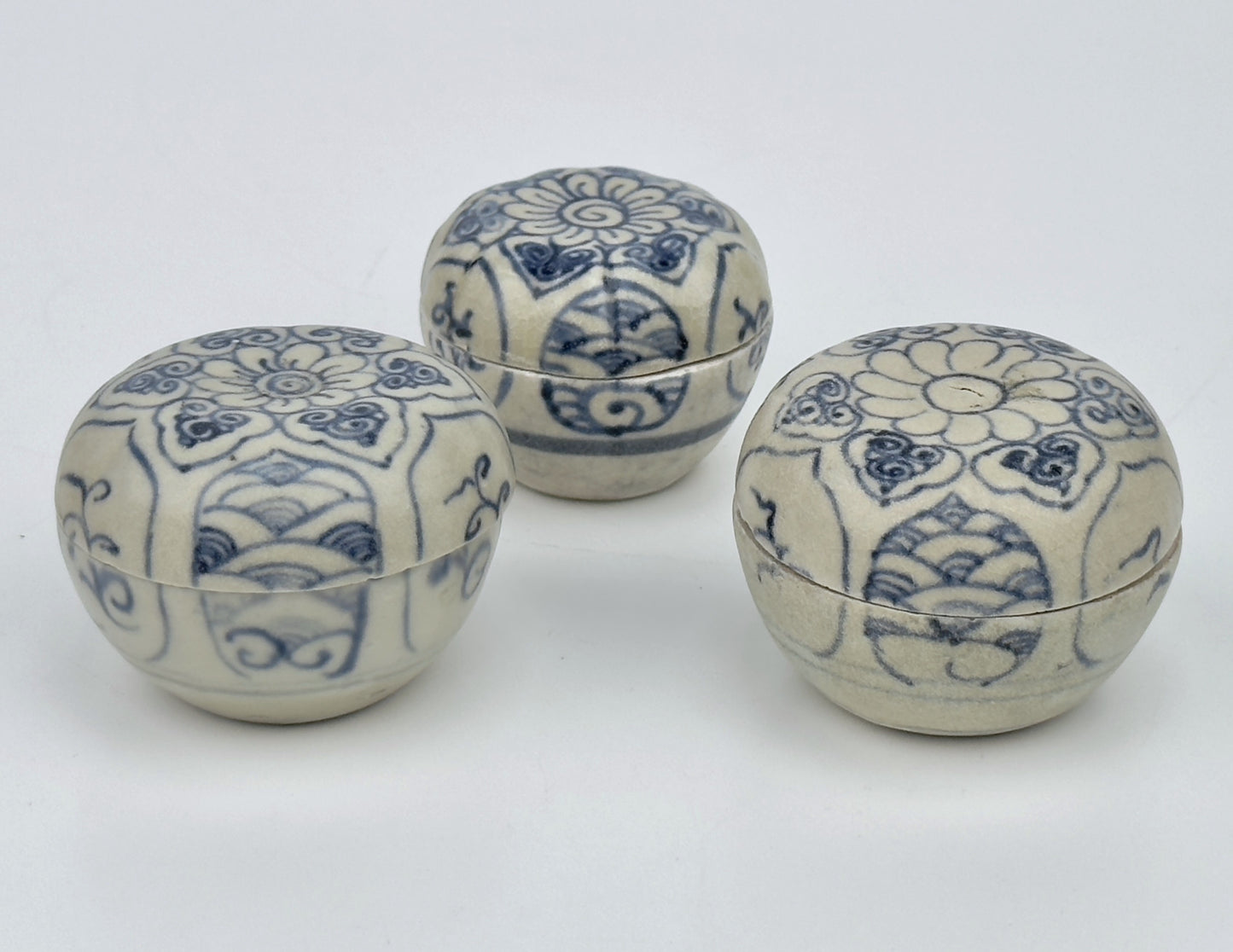 Three Annamese Small Lidded Boxes with flower design, 15th century, Le Dynasty