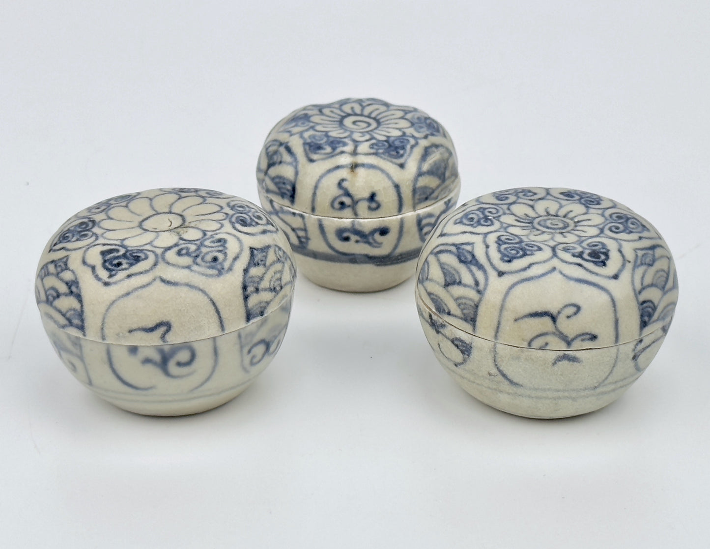 Three Annamese Small Lidded Boxes with flower design, 15th century, Le Dynasty