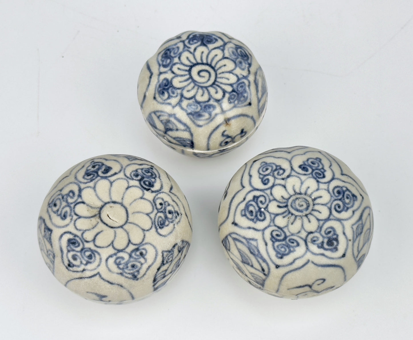 Three Annamese Small Lidded Boxes with flower design, 15th century, Le Dynasty