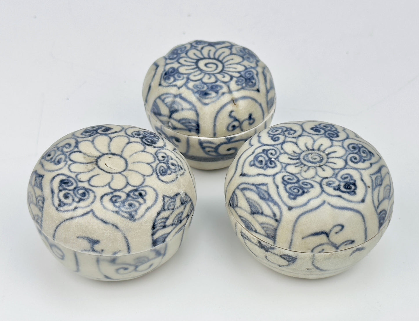 Three Annamese Small Lidded Boxes with flower design, 15th century, Le Dynasty