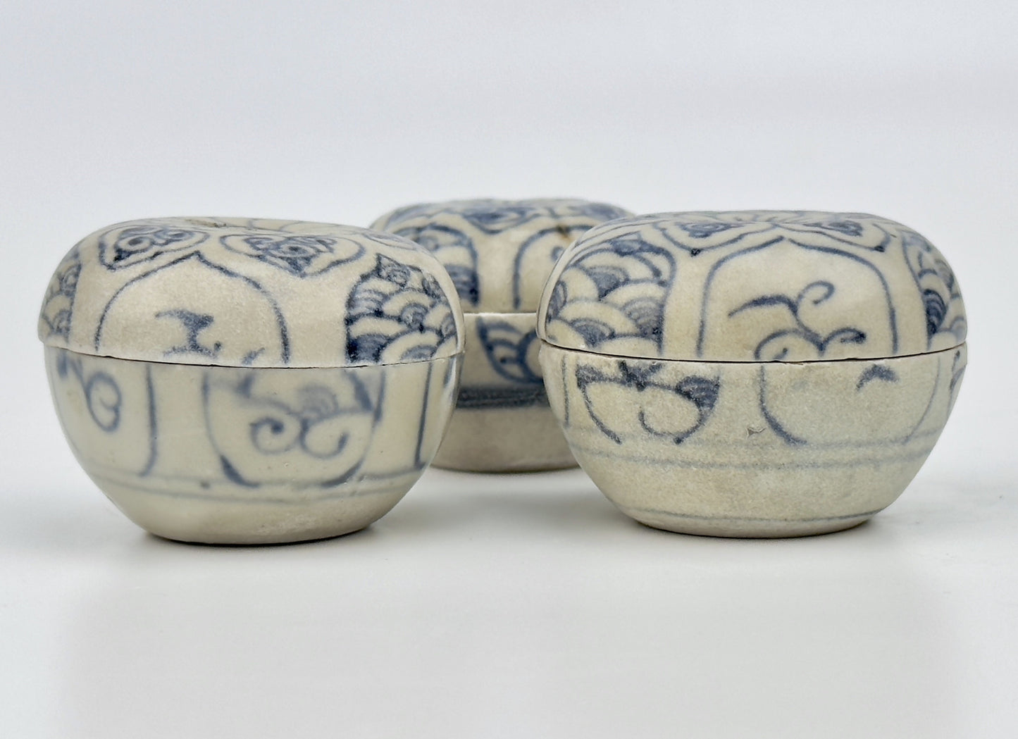 Three Annamese Small Lidded Boxes with flower design, 15th century, Le Dynasty