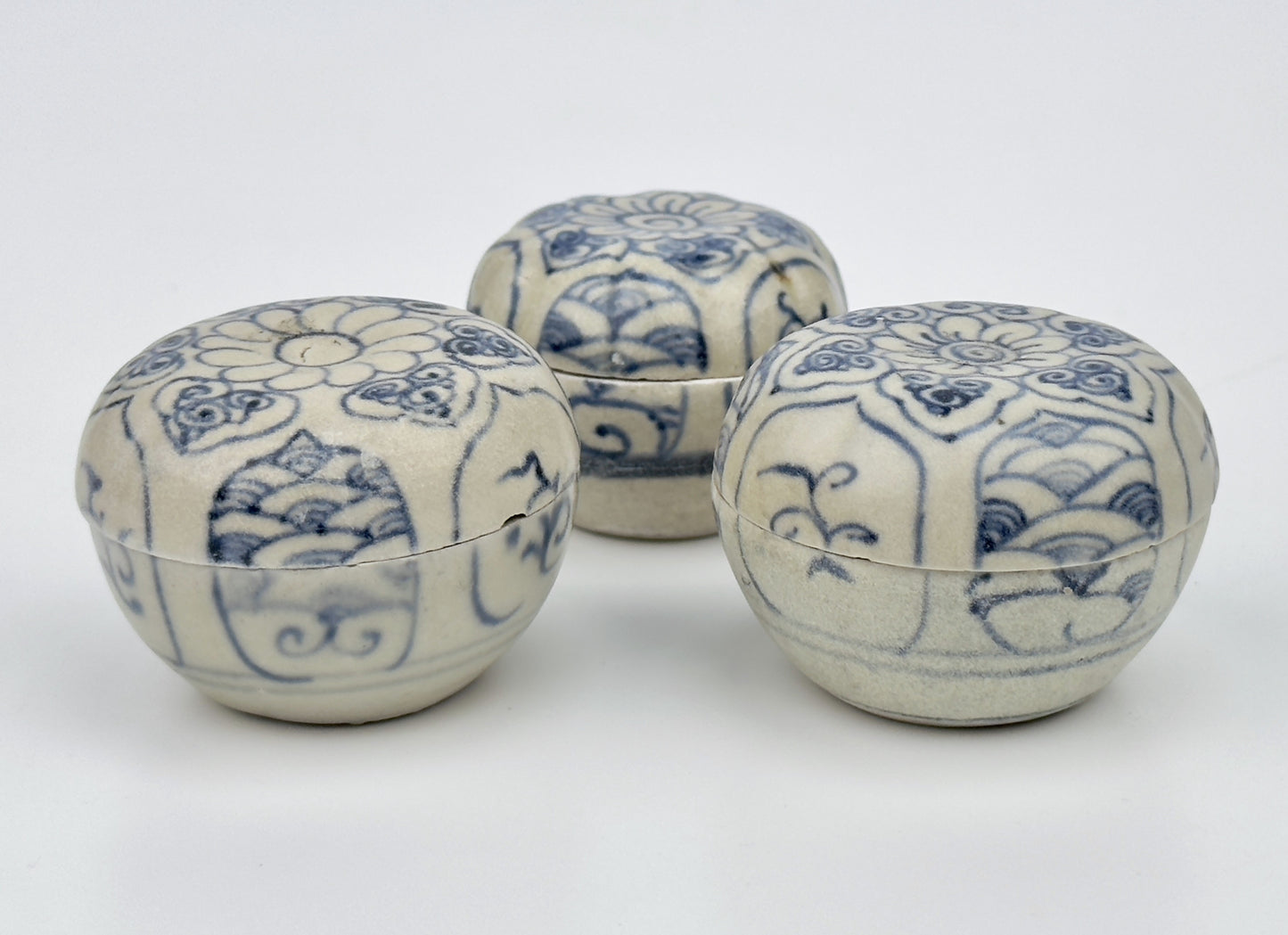 Three Annamese Small Lidded Boxes with flower design, 15th century, Le Dynasty