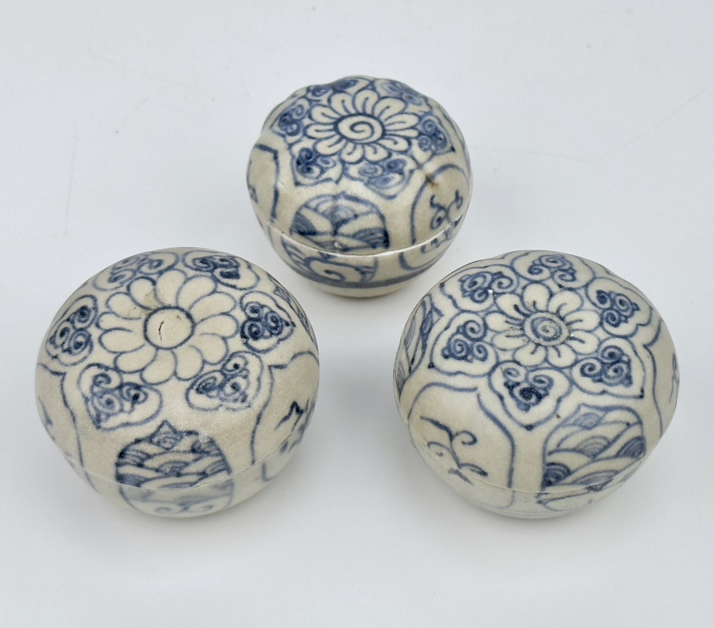 Three Annamese Small Lidded Boxes with flower design, 15th century, Le Dynasty