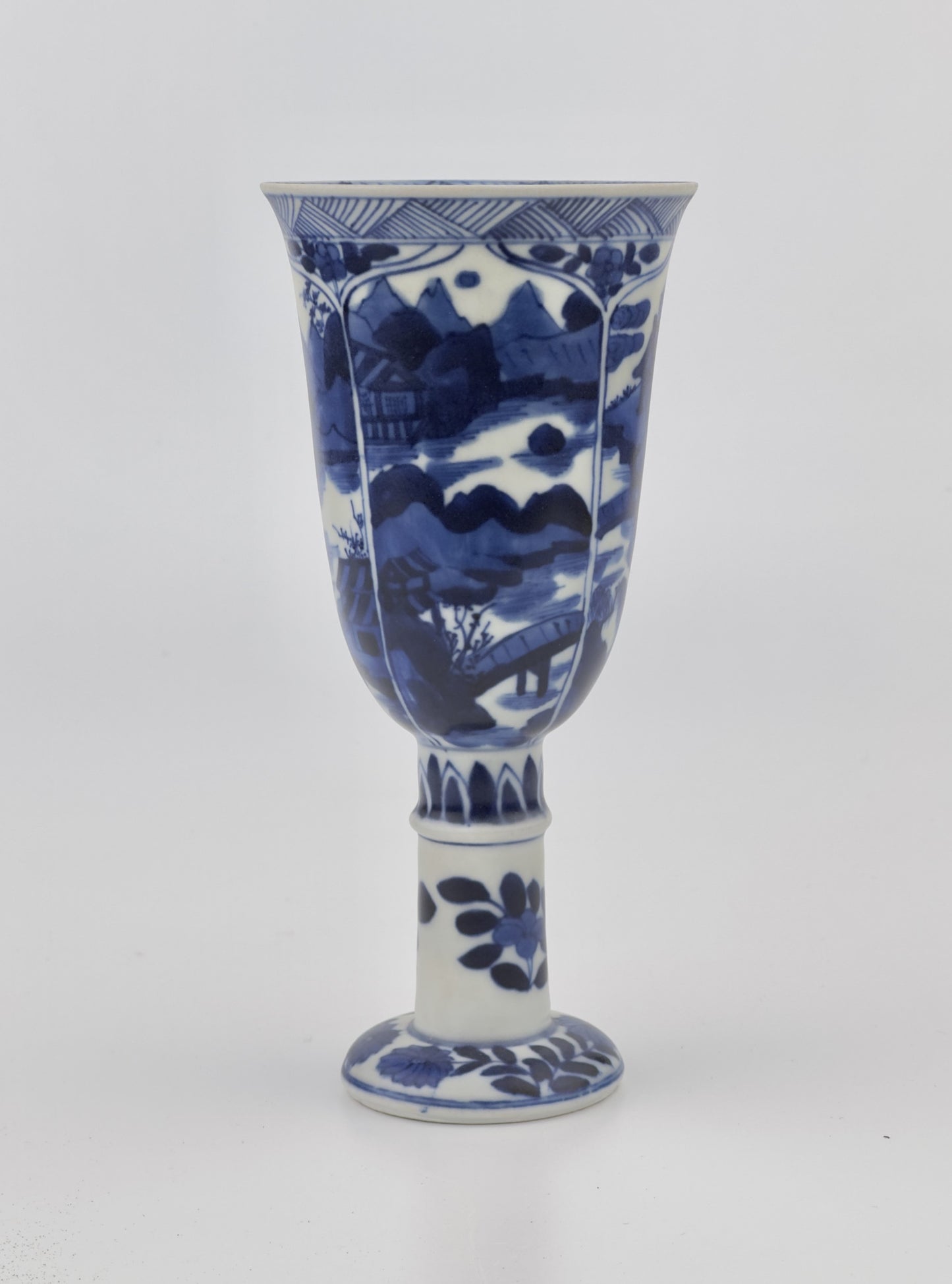 BLUE AND WHITE STEMCUP, QING DYNASTY, KANGXI ERA, CIRCA 1690