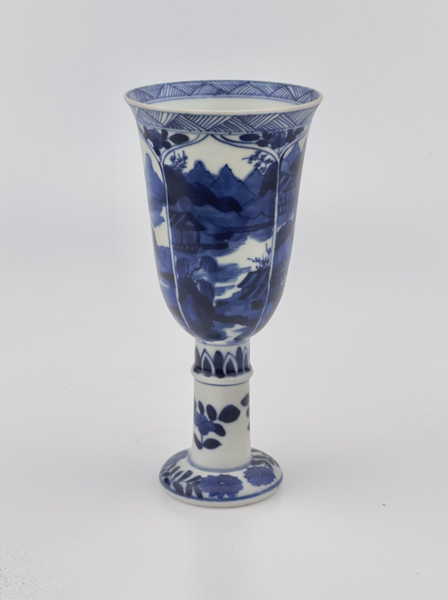 BLUE AND WHITE STEMCUP, QING DYNASTY, KANGXI ERA, CIRCA 1690