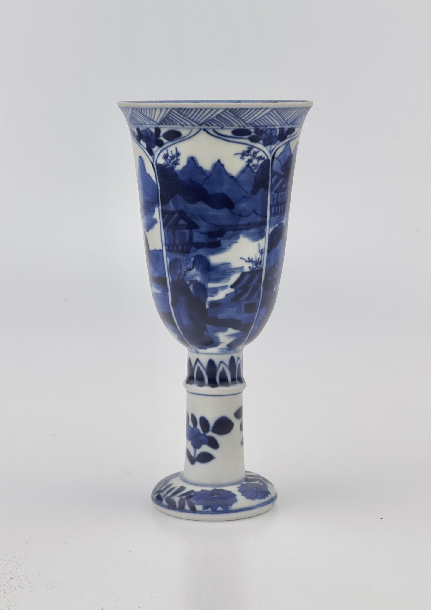 BLUE AND WHITE STEMCUP, QING DYNASTY, KANGXI ERA, CIRCA 1690