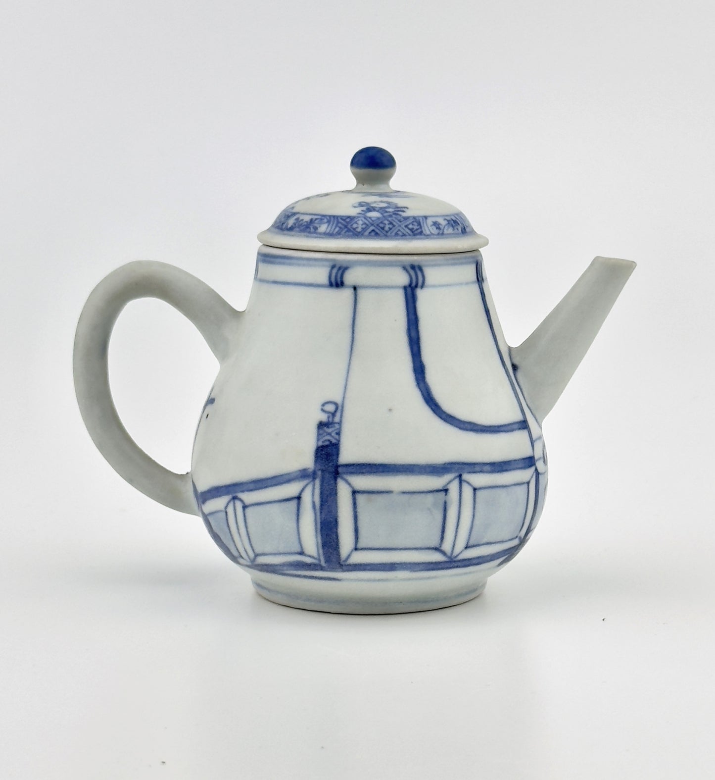 IMARI PAVILION PATTERN BLUE AND WHITE TEAPOT CIRCA 1725, QING DYNASTY, YONGZHENG REIGN