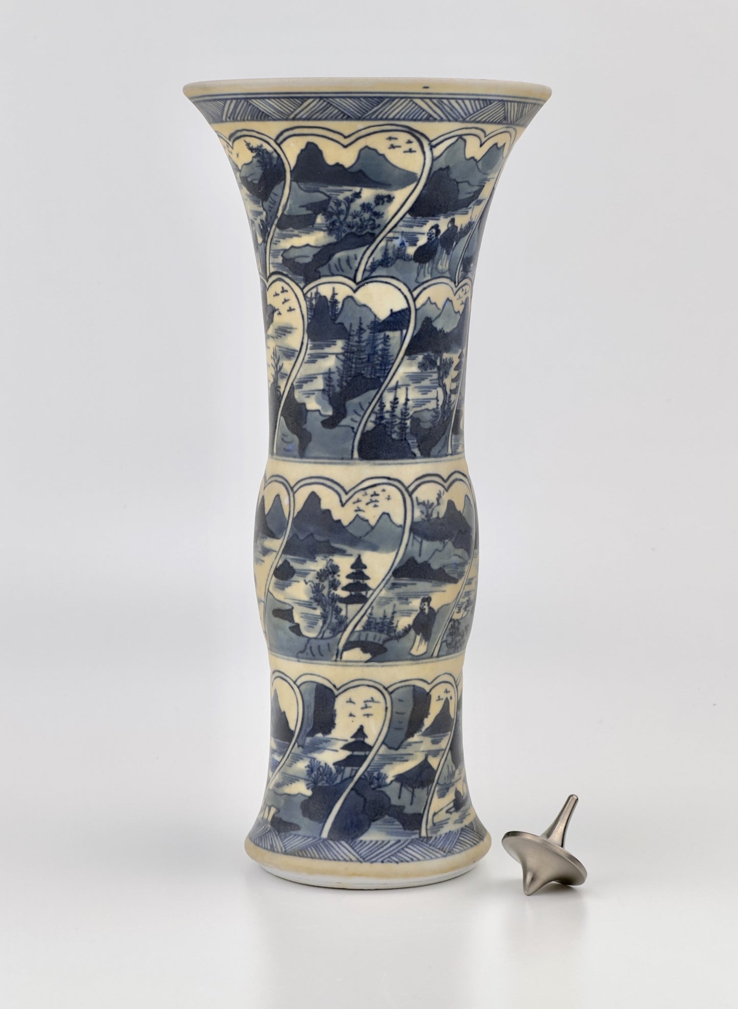 ANCIENT GU SHAPE BLUE AND WHITE 'RIVERSCAPES' VASE, QING DYNASTY, KANGXI ERA, CIRCA 1690