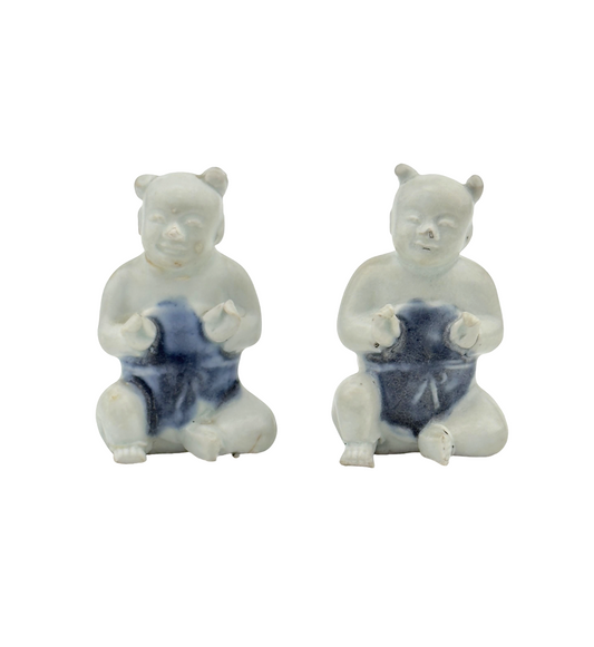 TWO FIGURINE OF SEATED BOYS, CIRCA 1725, QING DYNASTY, YONGZHENG REIGN