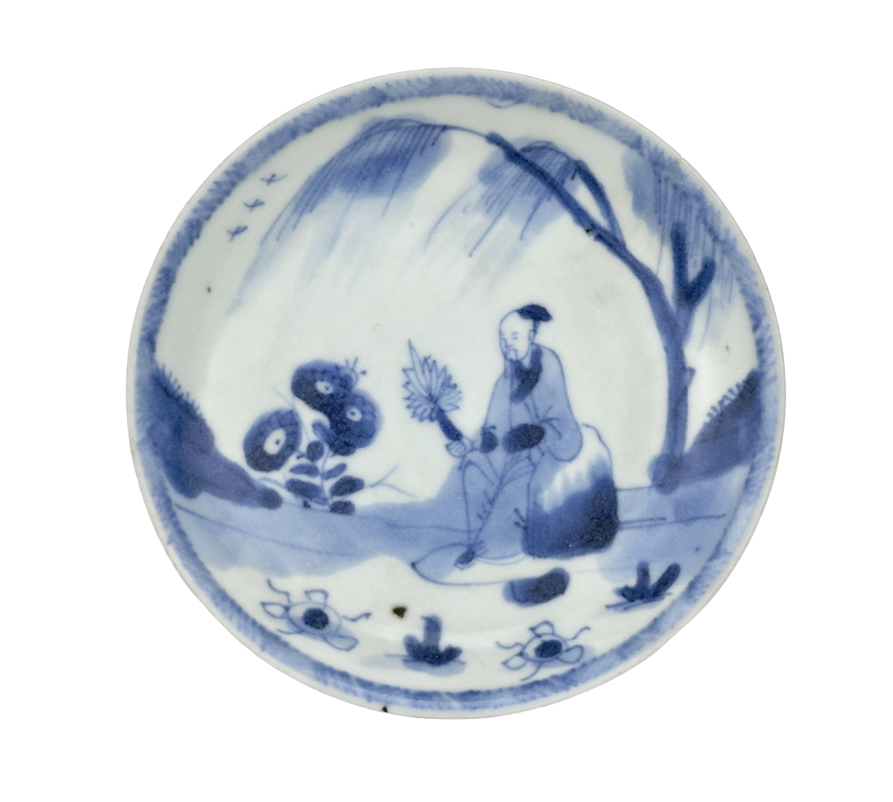 SCHOLARLY REPOSE BLUE AND WHITE SAUCER CIRCA 1725, QING DYNASTY, YONGZHENG REIGN