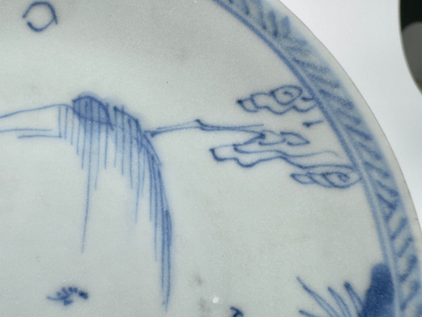 LEAF PASSING BLUE AND WHITE SAUCER CIRCA 1725, QING DYNASTY, YONGZHENG REIGN