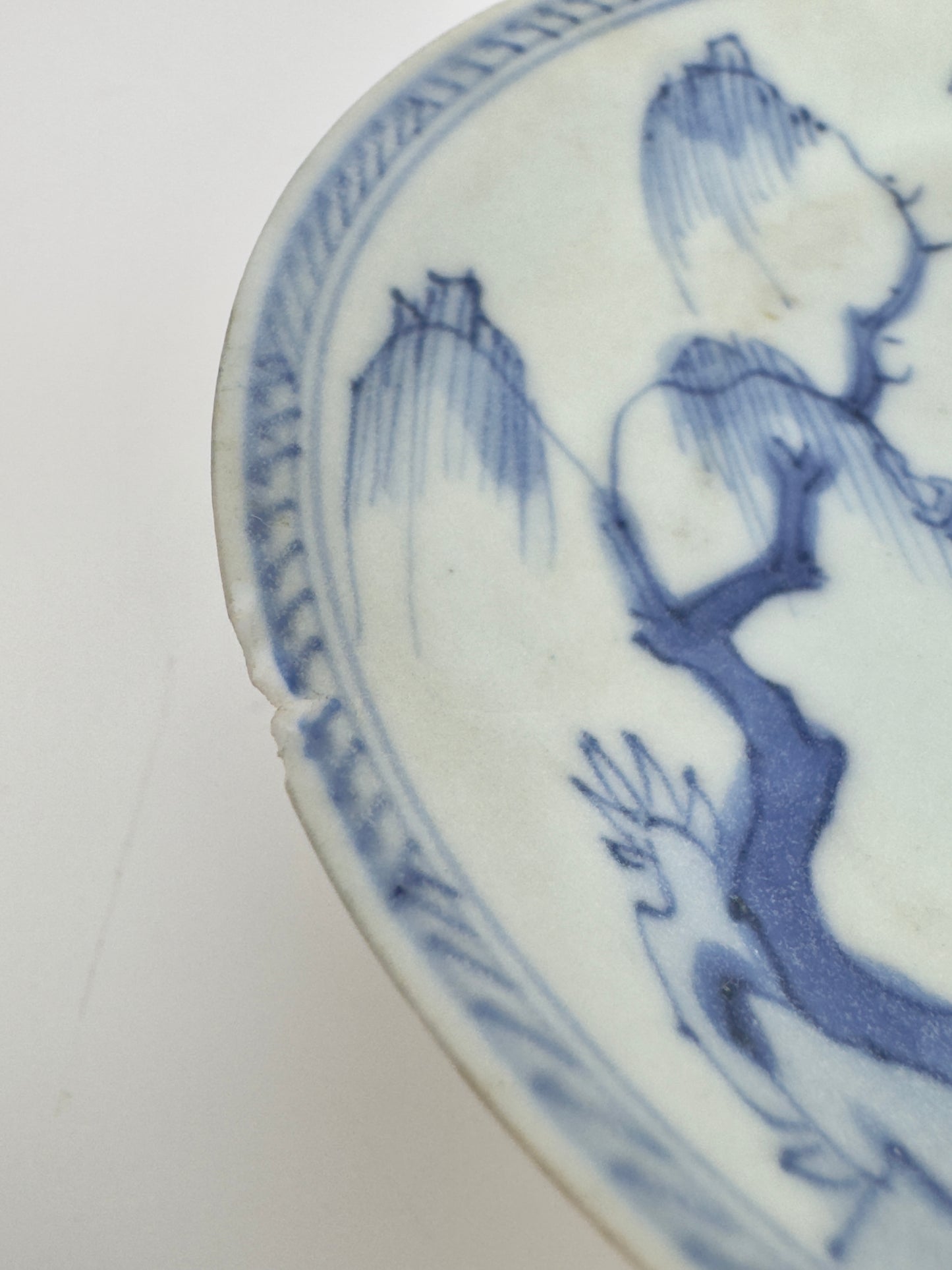 LEAF PASSING BLUE AND WHITE SAUCER CIRCA 1725, QING DYNASTY, YONGZHENG REIGN