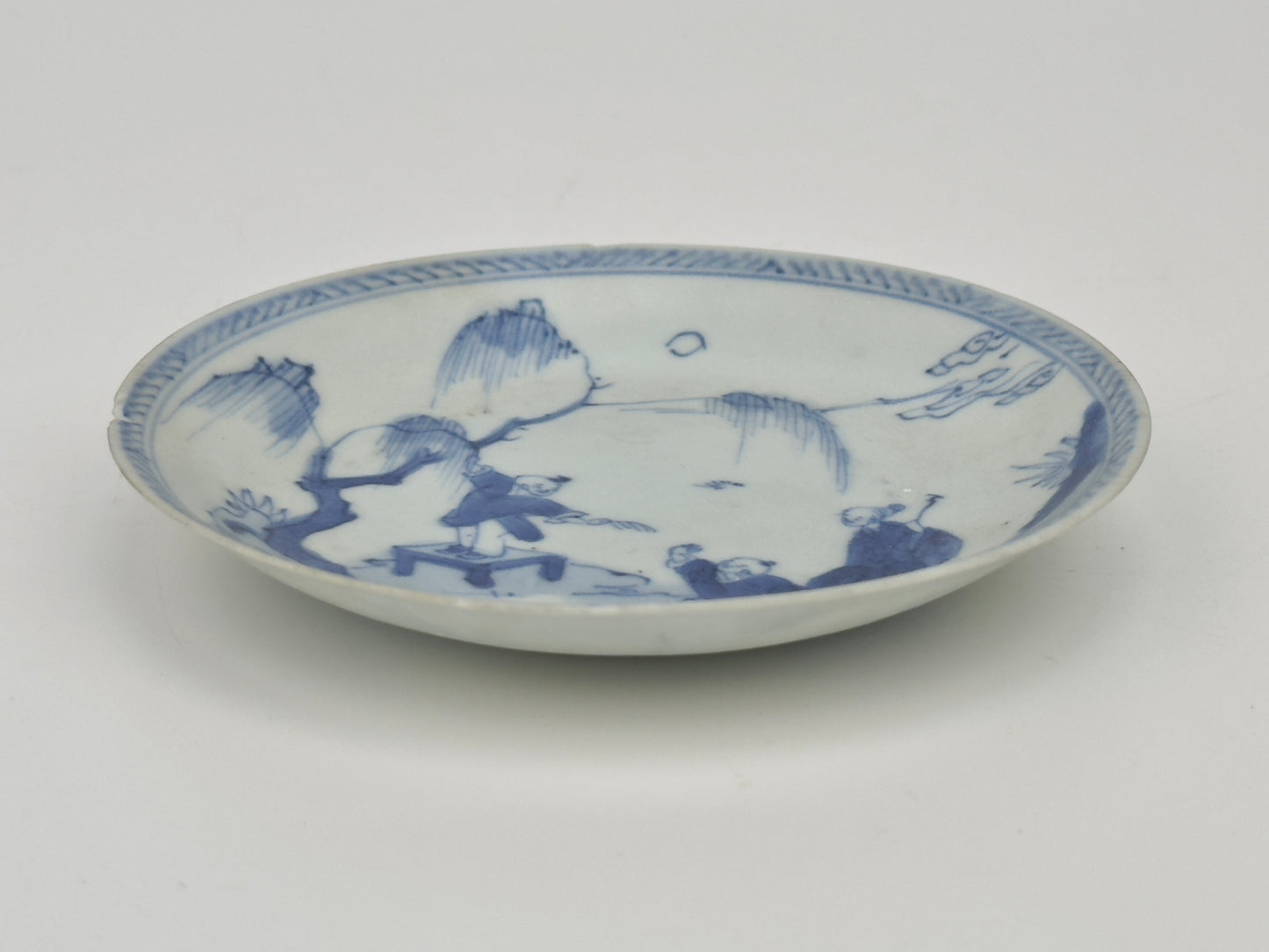 LEAF PASSING BLUE AND WHITE SAUCER CIRCA 1725, QING DYNASTY, YONGZHENG REIGN