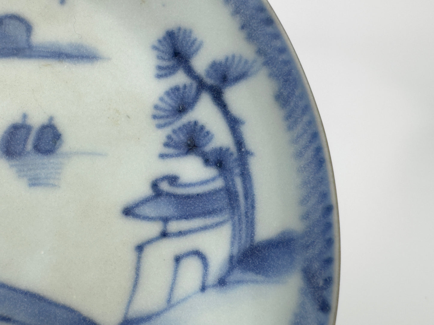 PASSING BOAT AND BRIDGE PATTERN BLUE AND WHITE TEABOWL AND SAUCER SET CIRCA 1725, QING DYNASTY, YONGZHENG ERA