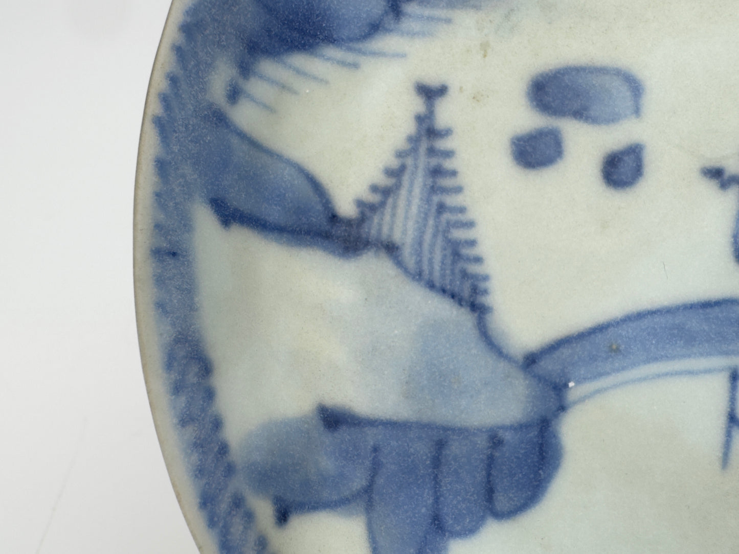 PASSING BOAT AND BRIDGE PATTERN BLUE AND WHITE TEABOWL AND SAUCER SET CIRCA 1725, QING DYNASTY, YONGZHENG ERA