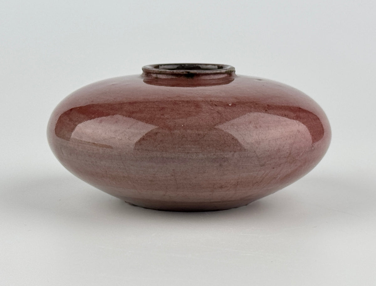 Qing Dynasty Langyao water coupe with rich crimson red copper glaze, rounded form, and lustrous finish, 18th–19th century.