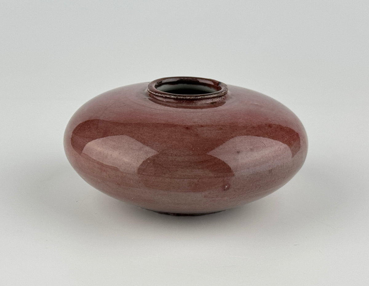 Qing Dynasty Langyao water coupe with rich crimson red copper glaze, rounded form, and lustrous finish, 18th–19th century.