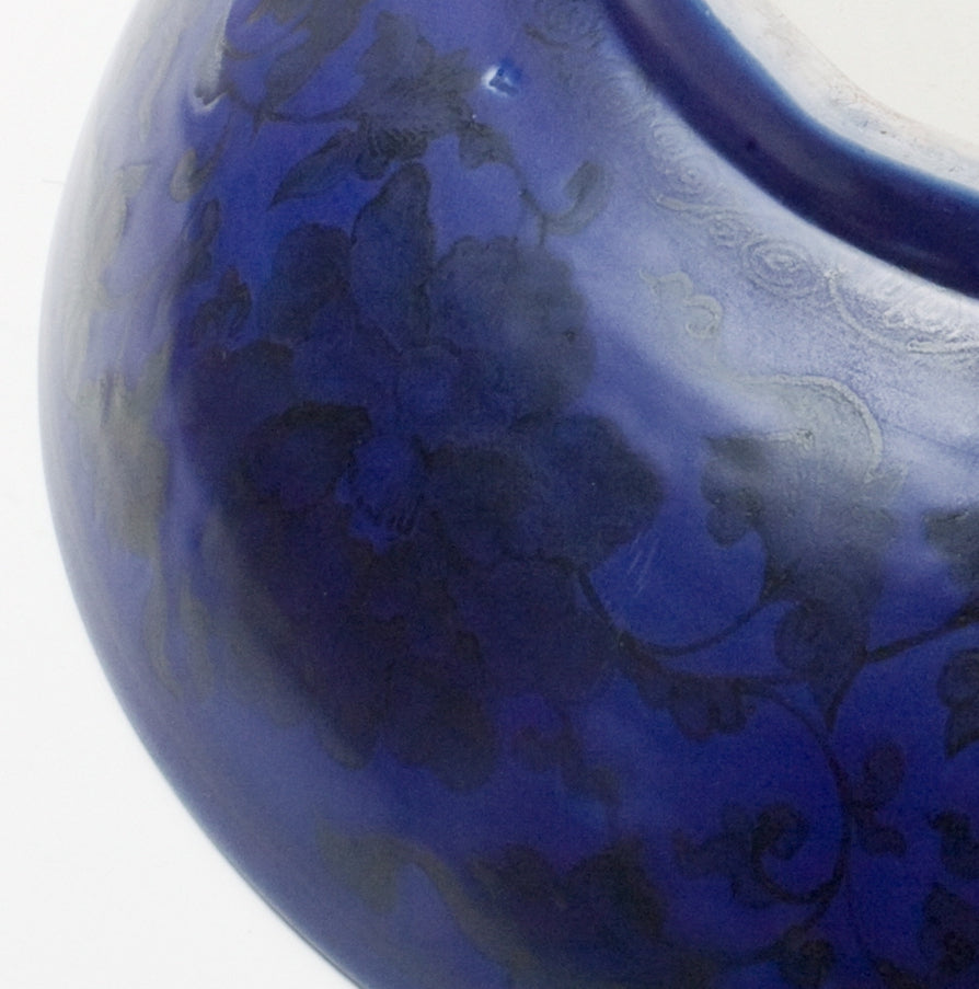 Large Qing Dynasty cobalt-blue glazed porcelain dish with rockwork and floral motifs, shipwreck-recovered, Kangxi-Yongzheng period.