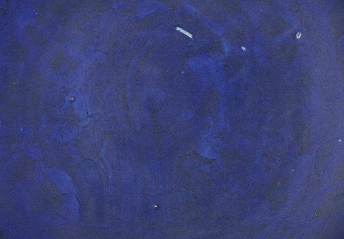 Large Qing Dynasty cobalt-blue glazed porcelain dish with rockwork and floral motifs, shipwreck-recovered, Kangxi-Yongzheng period.