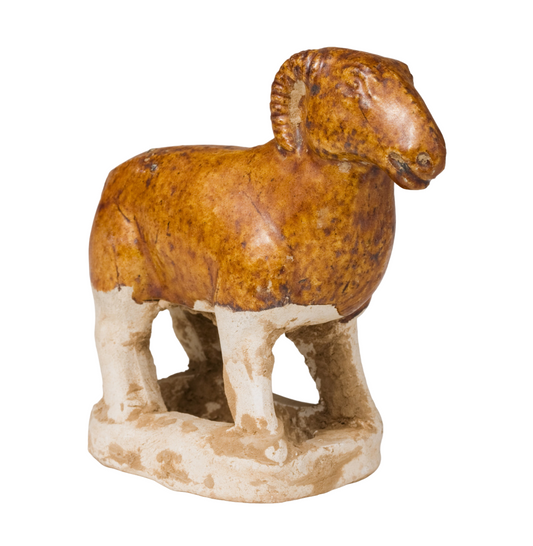 AMBER-GLAZED POTTERY FIGURE OF SHEEP, TANG-LIAO DYNASTY (7-12TH CENTURY)