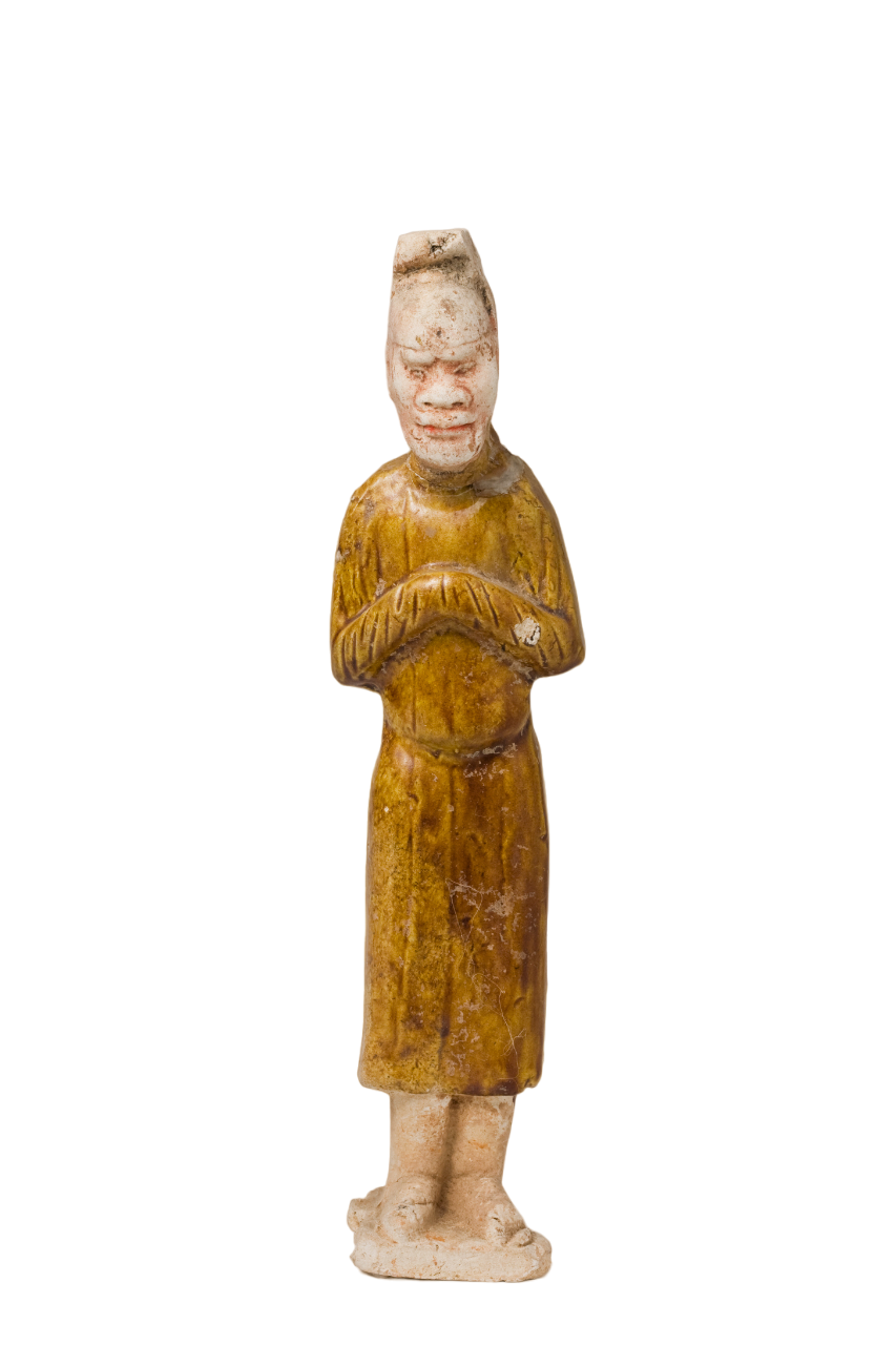 AMBER-GLAZED POTTERY FIGURE OF AN FOREIGN OFFICIAL, TANG-LIAO DYNASTY (7-12TH CENTURY)