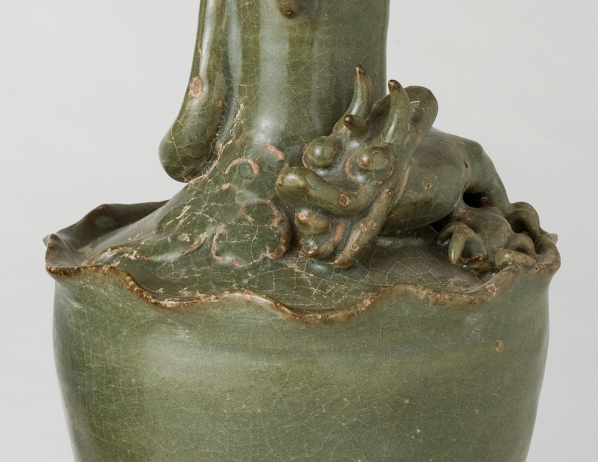 Pair of olive-green Longquan celadon vases with sculpted bird, mystical beasts, Sui-Song Dynasty.