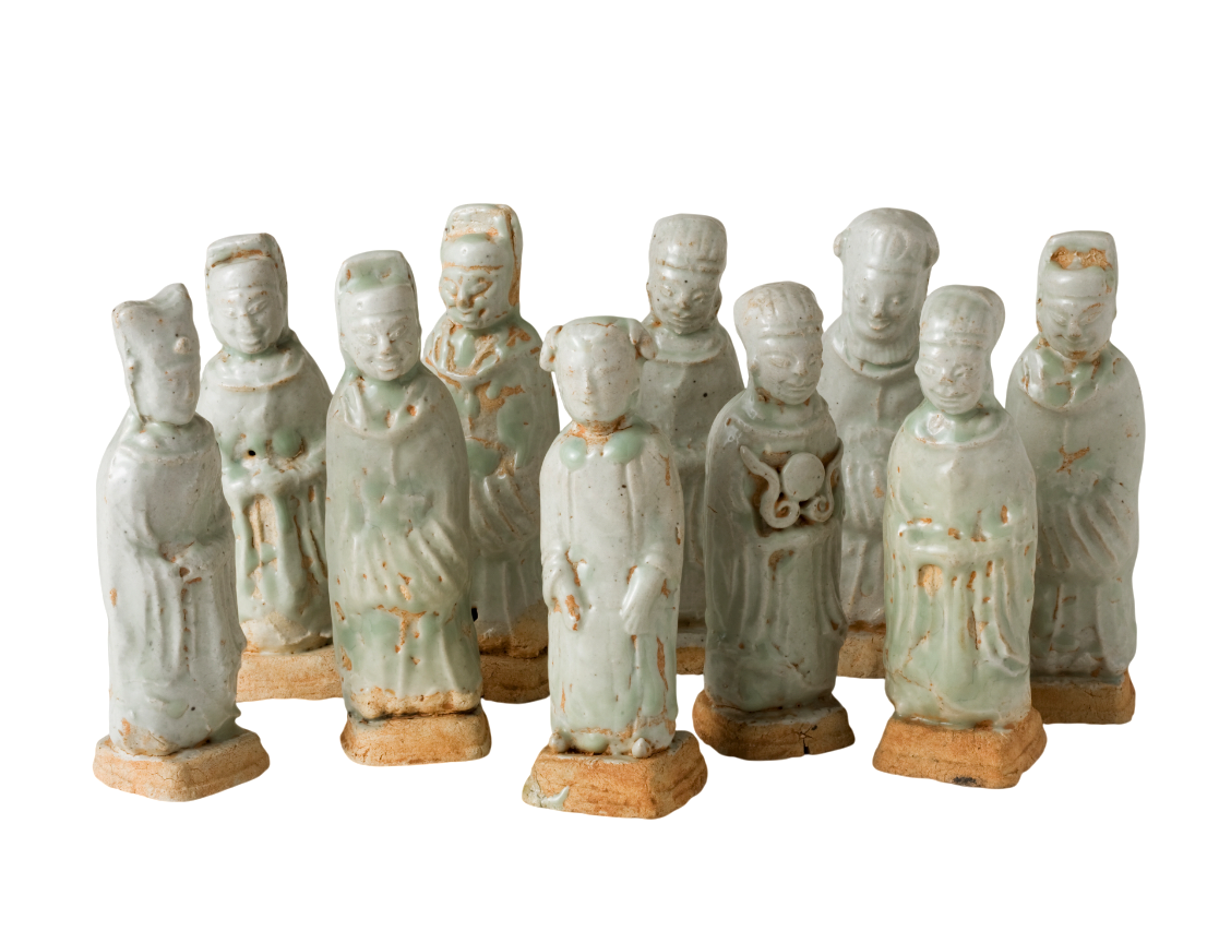 Ten Qingbai porcelain courtier figurines, Five Dynasties to Song Dynasty, with official robes and square pedestals.