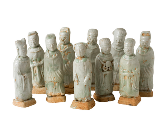 Ten Qingbai porcelain courtier figurines, Five Dynasties to Song Dynasty, with official robes and square pedestals.
