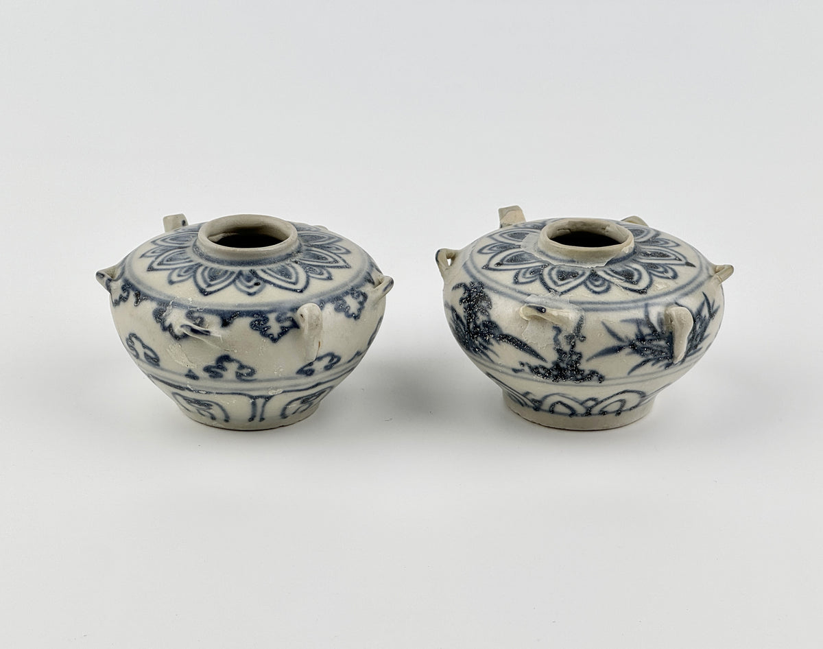 Vietnamese Chu Dau kilns blue-and-white water vessels with lotus, cloud-scroll, and orchid motifs, Le Dynasty.