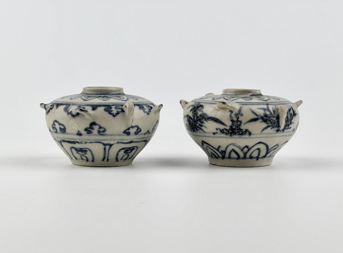 Vietnamese Chu Dau kilns blue-and-white water vessels with lotus, cloud-scroll, and orchid motifs, Le Dynasty.