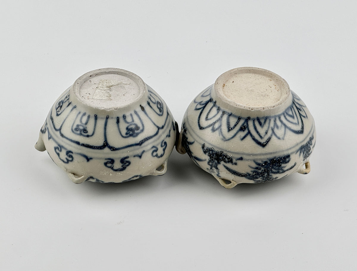 Vietnamese Chu Dau kilns blue-and-white water vessels with lotus, cloud-scroll, and orchid motifs, Le Dynasty.