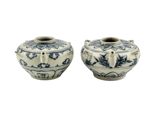 Vietnamese Chu Dau kilns blue-and-white water vessels with lotus, cloud-scroll, and orchid motifs, Le Dynasty.